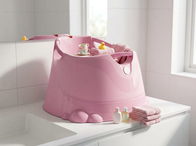 Opla badje pastel roze op een wit badkamerblad met roze handdoeken - realistische afmetingen